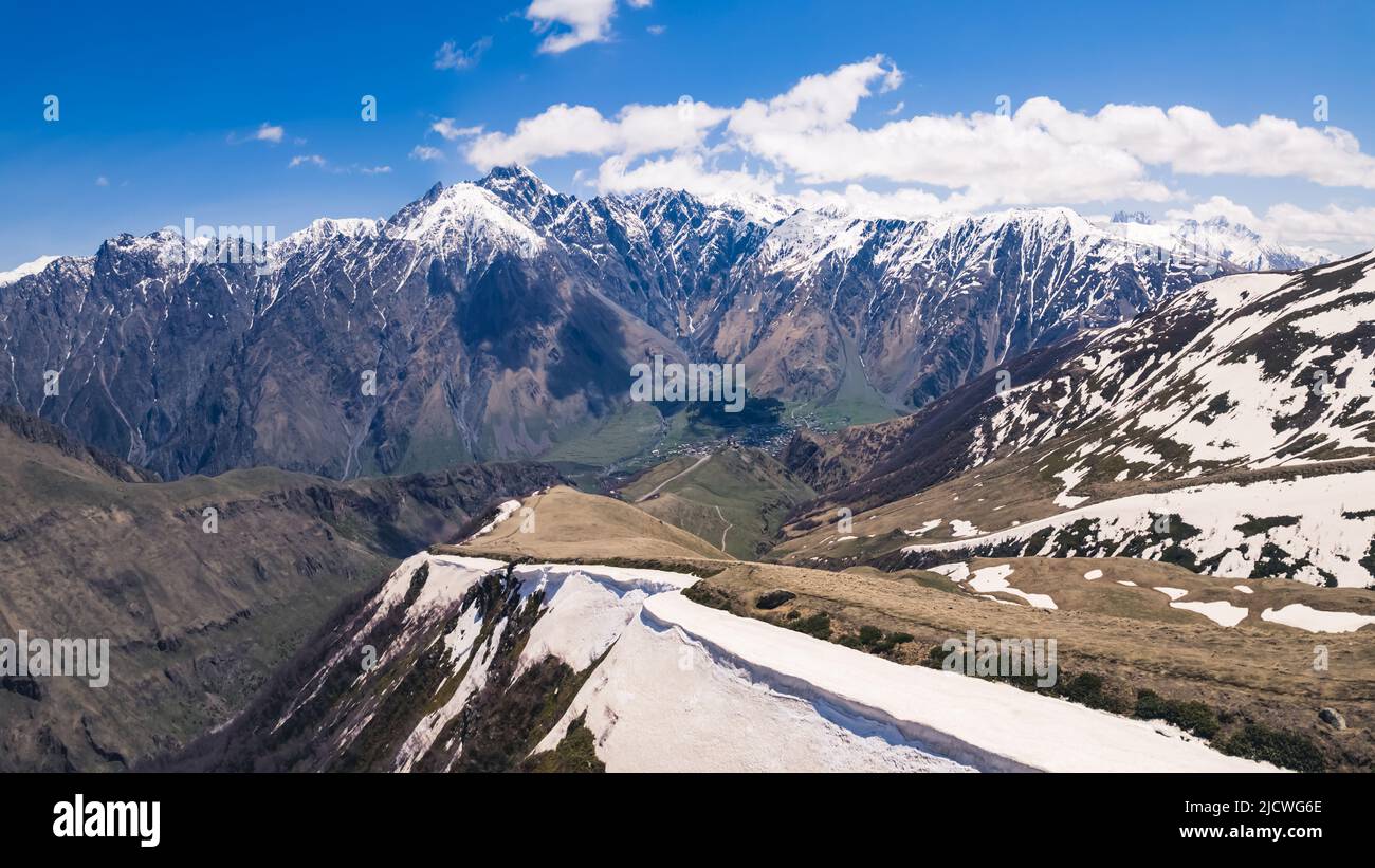 amazing view of Caucasus mountains and Mkinvartsveri in Kazbegi, Georgia. High quality photo Stock Photo