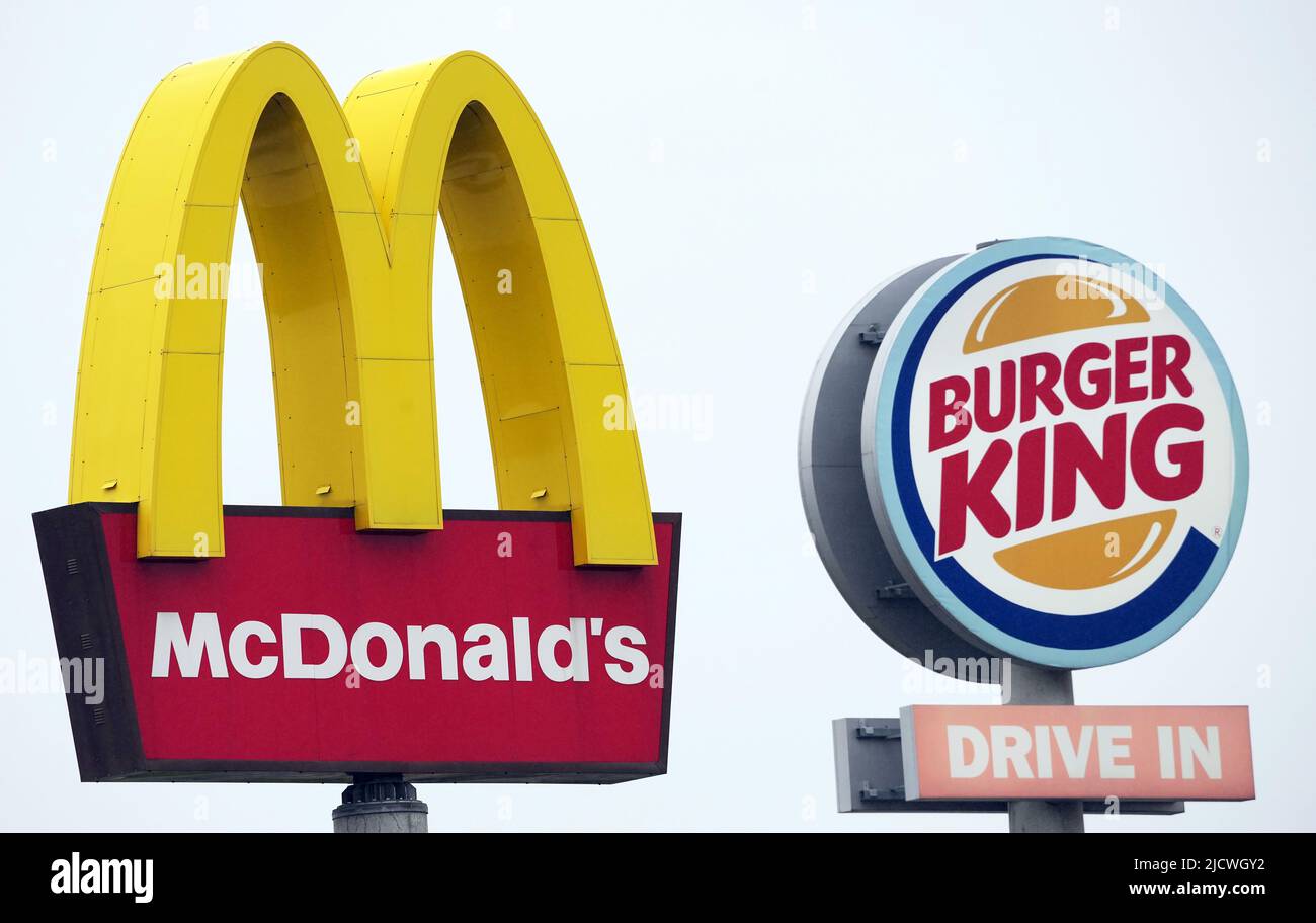 Germany. 30th Apr, 2022. The logos of Mcdonald's as well as Burger King stand next to the respective fast food restaurants at a highway rest stop. Credit: Soeren Stache/dpa/Alamy Live News Stock Photo