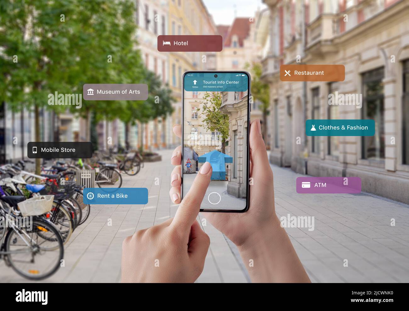 Tourist information and signposts on smart phone in tourist hands. The concept of using augmented reality apps and technology in tourism Stock Photo