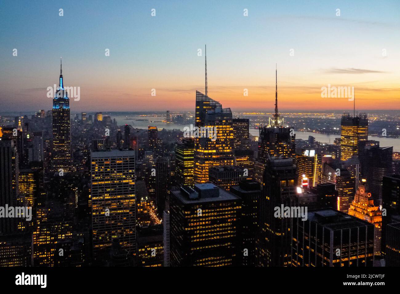 View of Manhattan skyline at sunset from Top of The Rock observation deck, New York, United Staes Stock Photo