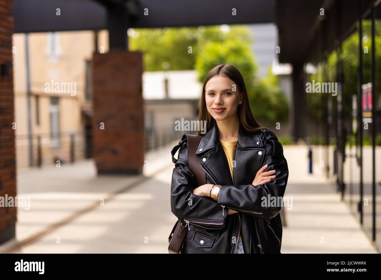 Portrait of a young happy and pretty girl walking street Stock Photo ...