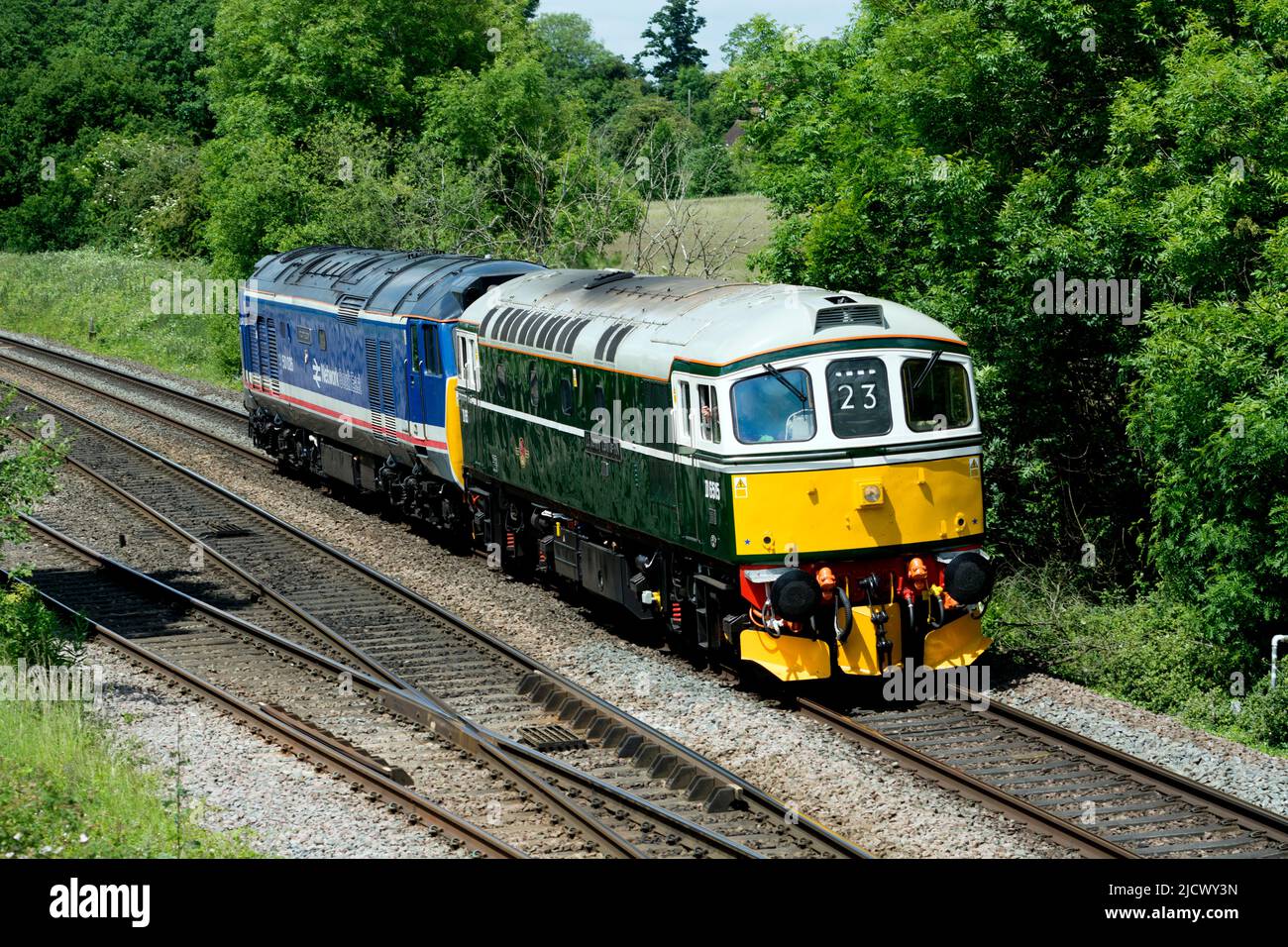 Preserved diesel locomotives, Class 33 No. D6515 'Lt Jenny Lewis RN' and Class 50 No. 50025 'Indomitable' travelling light engine, Warwickshire, UK Stock Photo