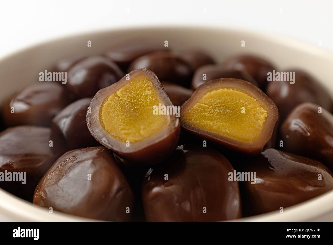 smoked quail eggs on a white background Stock Photo