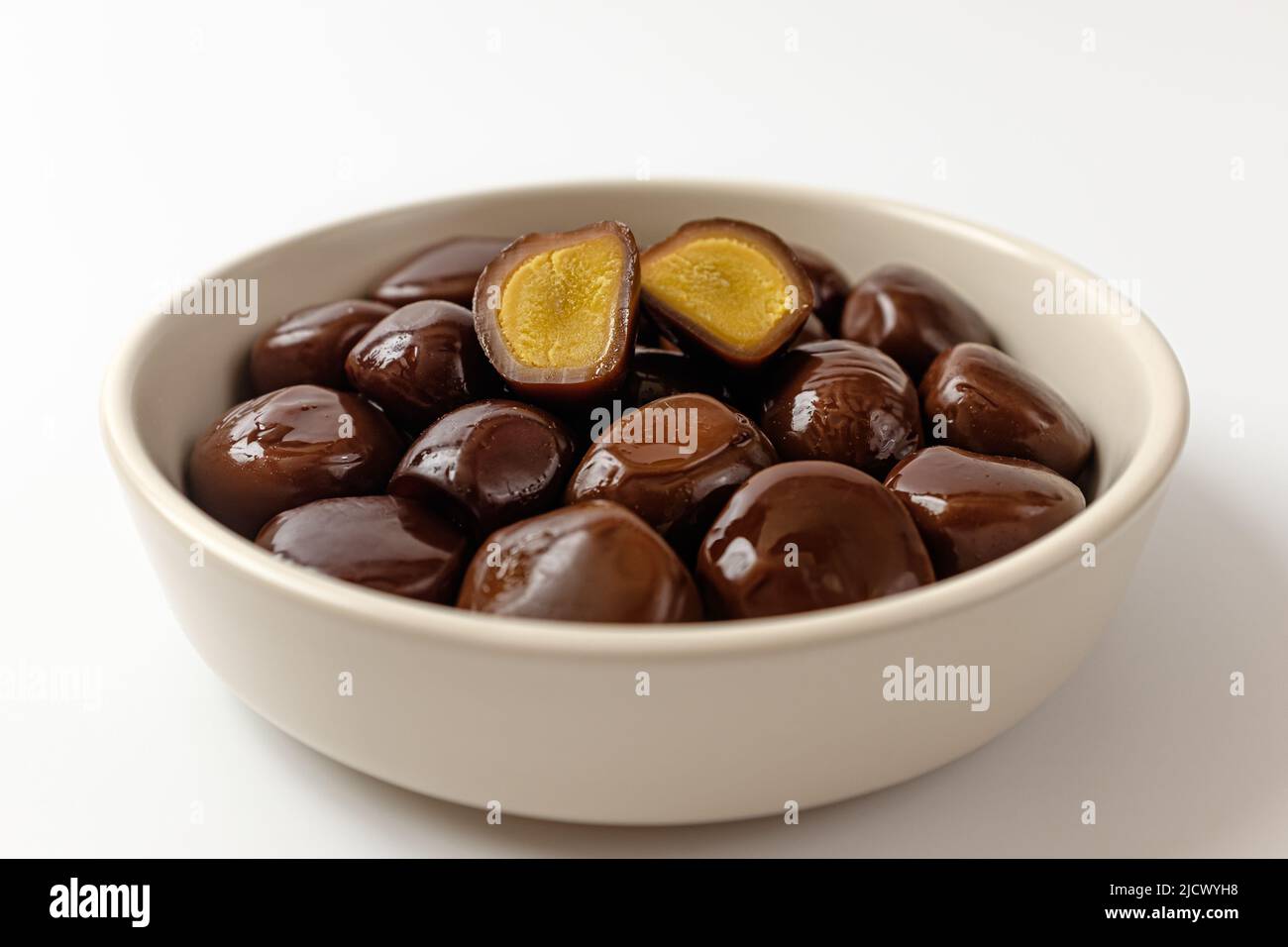 smoked quail eggs on a white background Stock Photo