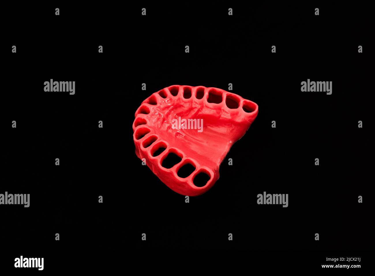 human gums without teeth model medical implant isolated on black ...