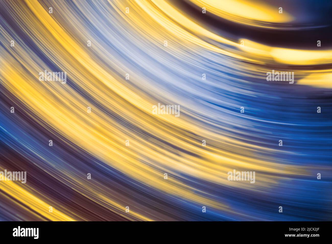 Abstract blue and yellow light trails Stock Photo