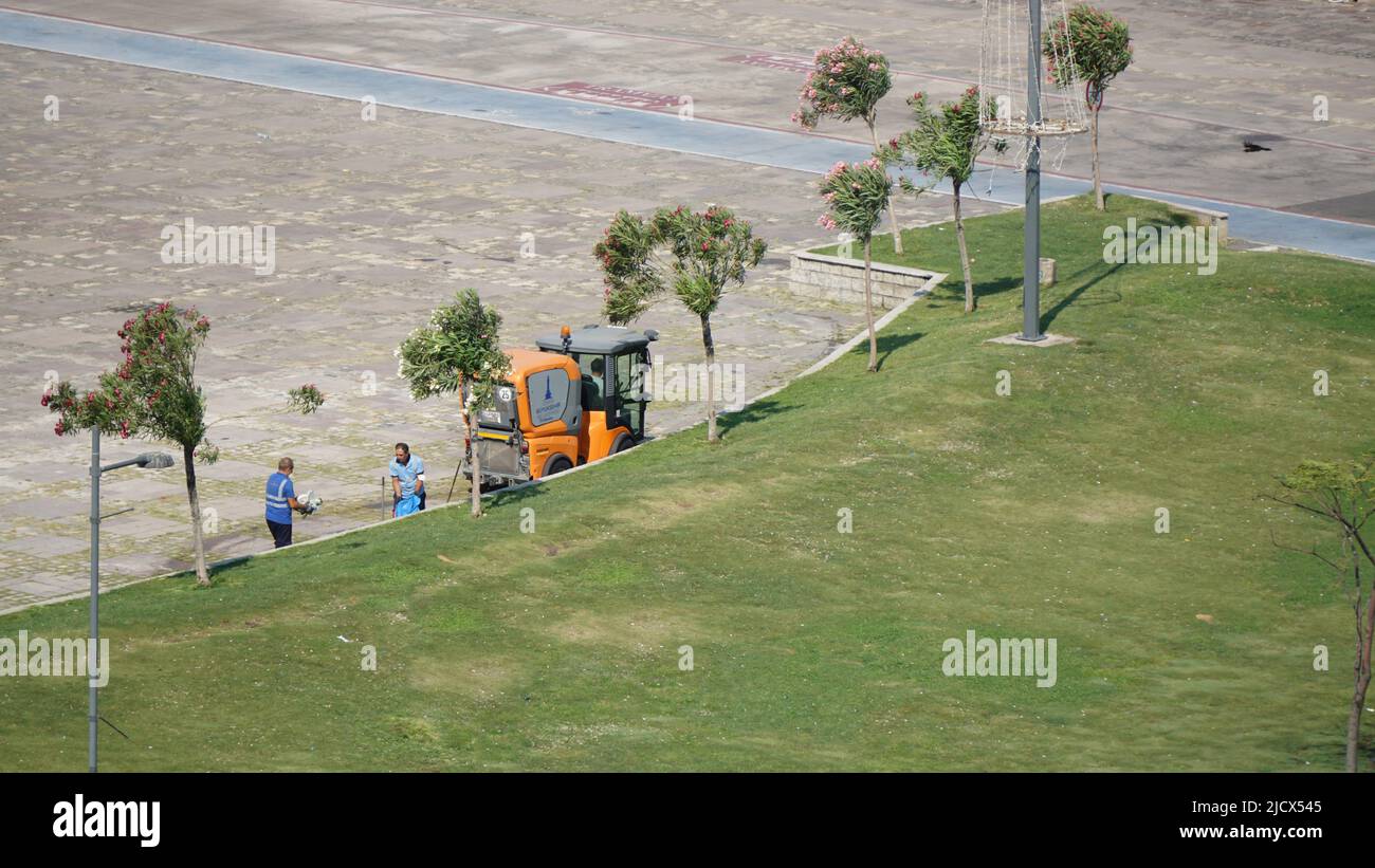 22 July 2021 Izmir Turkey. Municipality workers cleaning up Alsancak kordon in the morning Stock Photo