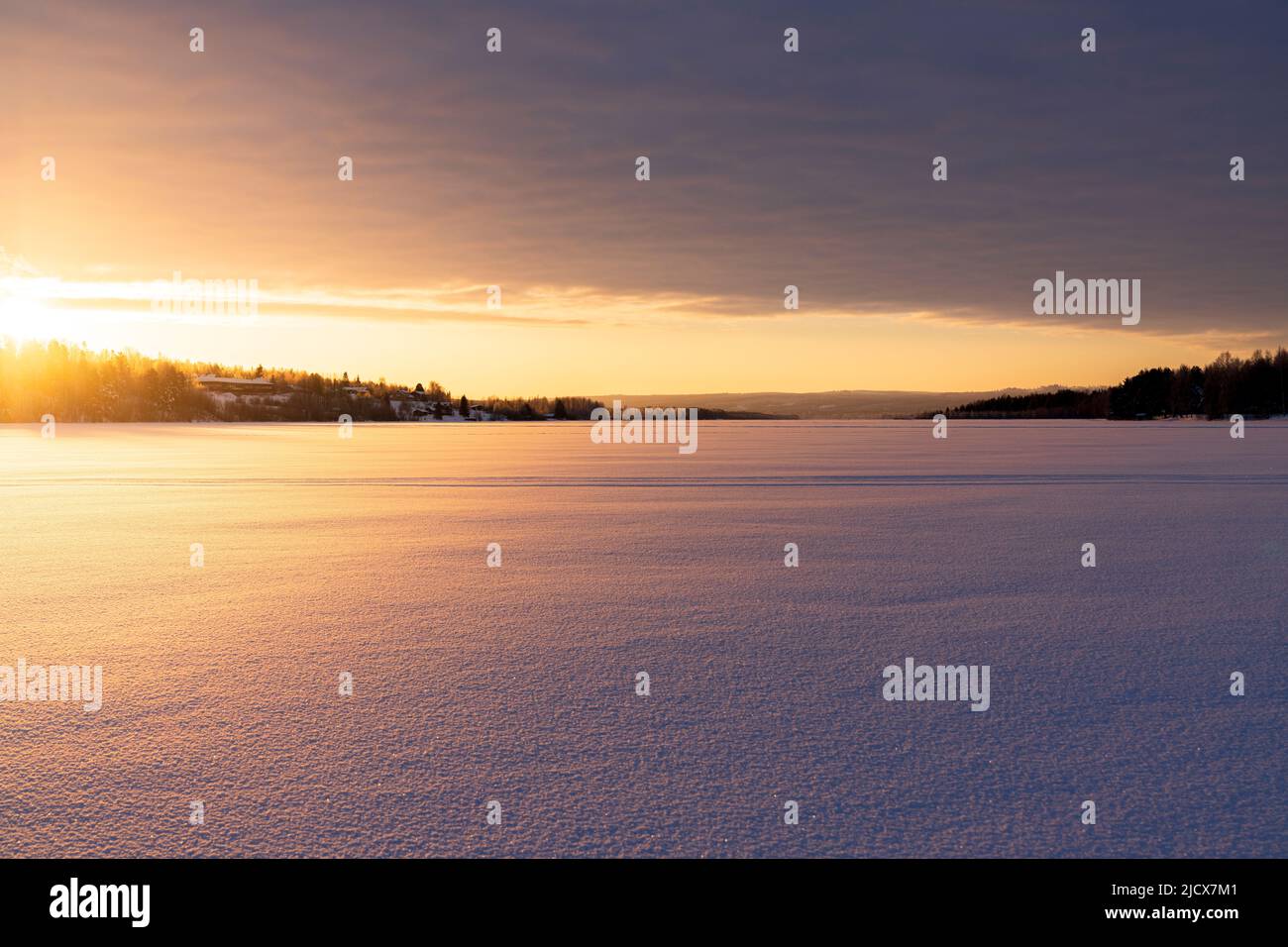 Arctic sunrise over the frozen landscape covered with snow in winter, Harads, Lapland, Sweden, Scandinavia, Europe Stock Photo