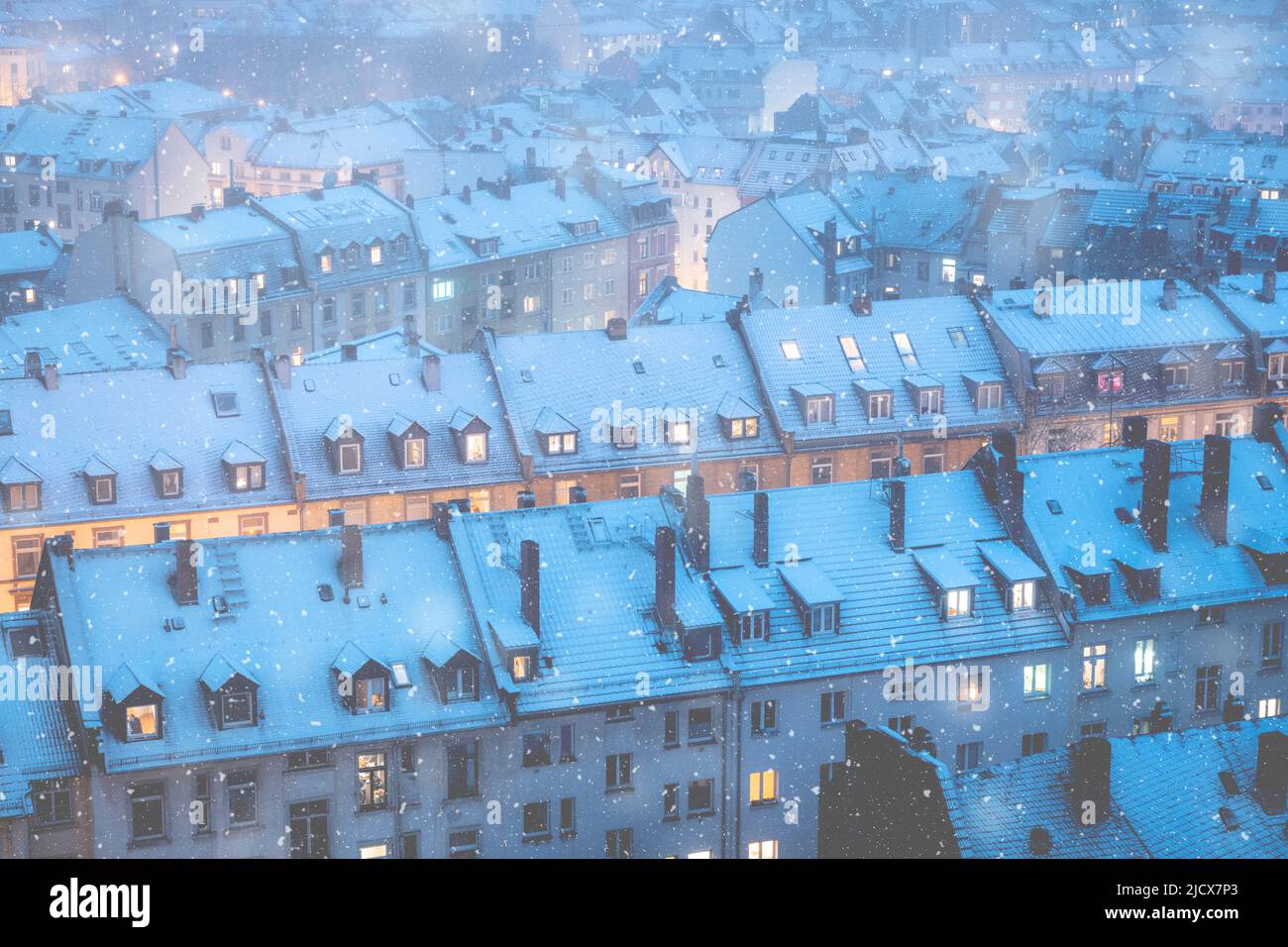 Snow falling over the traditional houses of the old town at dusk, Frankfurt am Main, Hesse, Germany Europe Stock Photo
