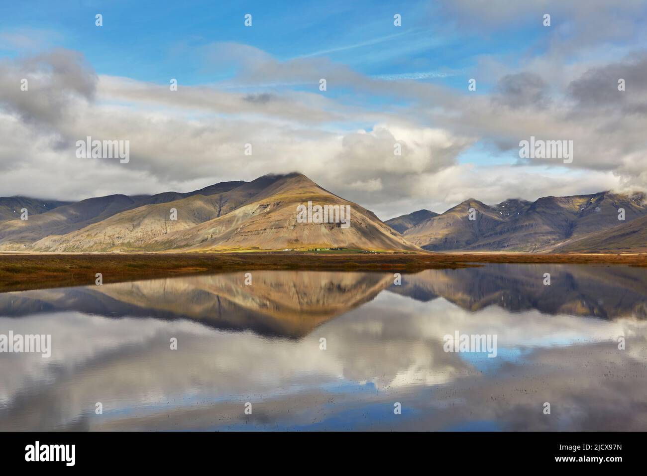Mountains and reflections in a lake, near Hofn, southeast Iceland, Polar Regions Stock Photo