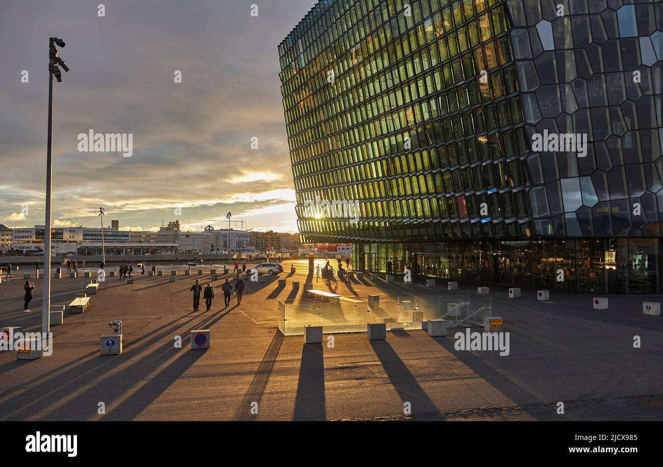 A Sunset View Of The Harpa Concert Hall Beside The Old Harbour A Sunset View Of The Harpa Concert Hall Beside The Old Harbour