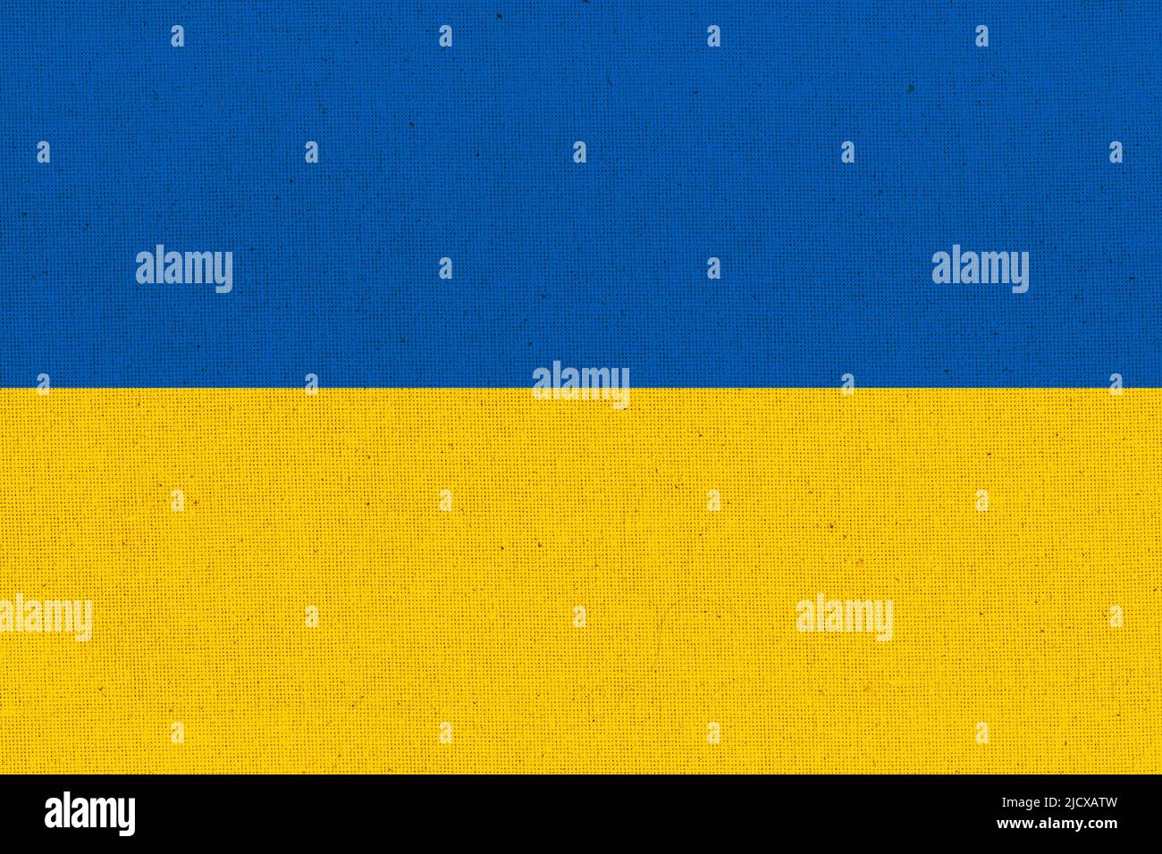 Flag of Ukraine. Ukrainian flag on fabric surface. Fabric texture. National symbol of Ukraine on patterned background. Republic of Turkey Stock Photo