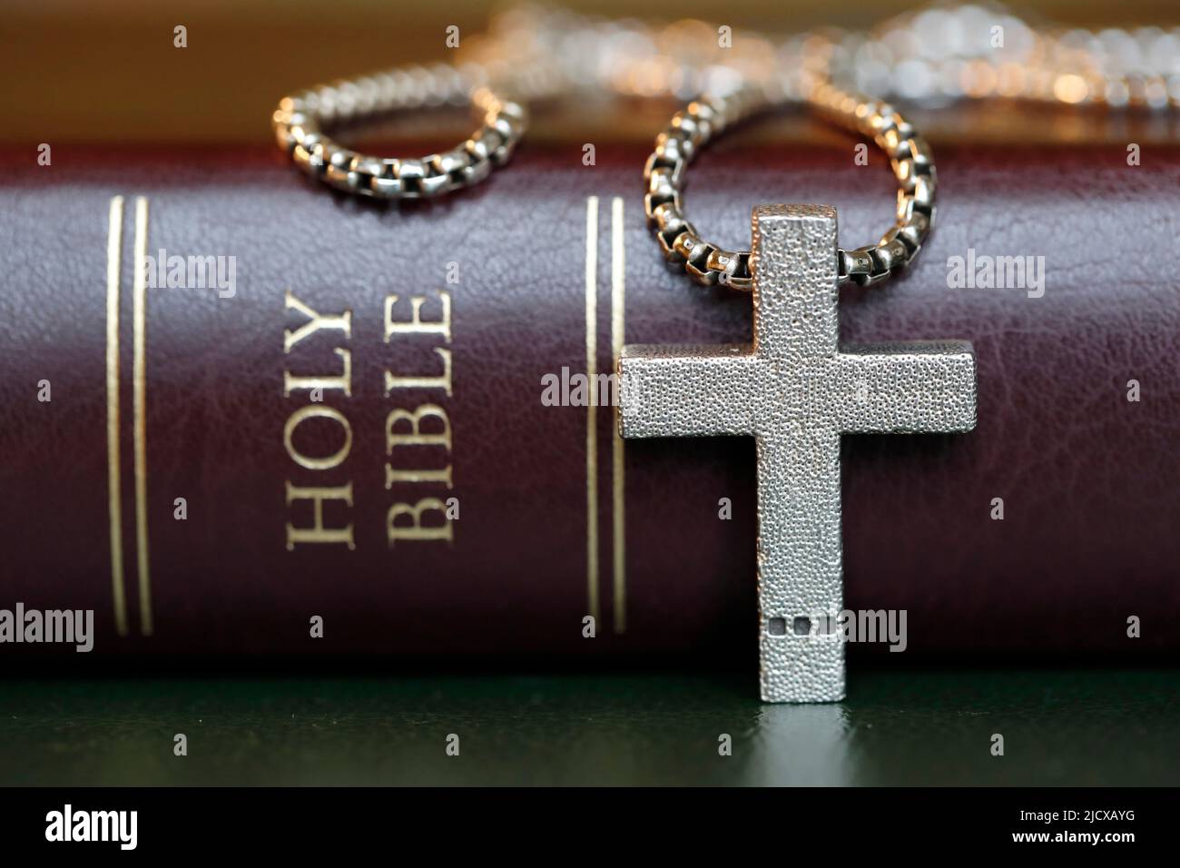 Holy Bible book with a Christian cross, symbol of Christianity, Yonne, France, Europe Stock Photo