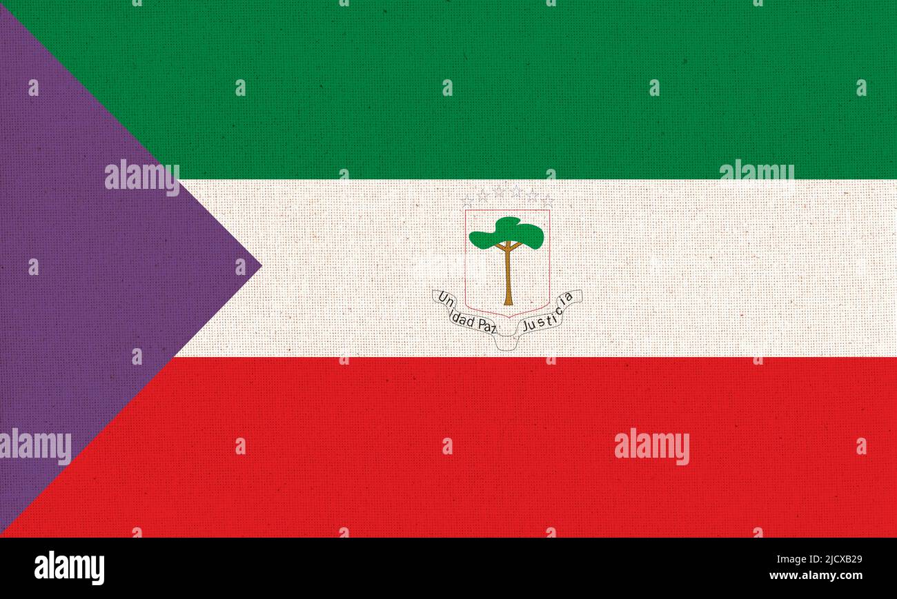 Flag of Equatorial Guinea. Equatorial Guinea flag on fabric surface. Fabric texture. National symbol of Equatorial Guinea on patterned background. Rep Stock Photo
