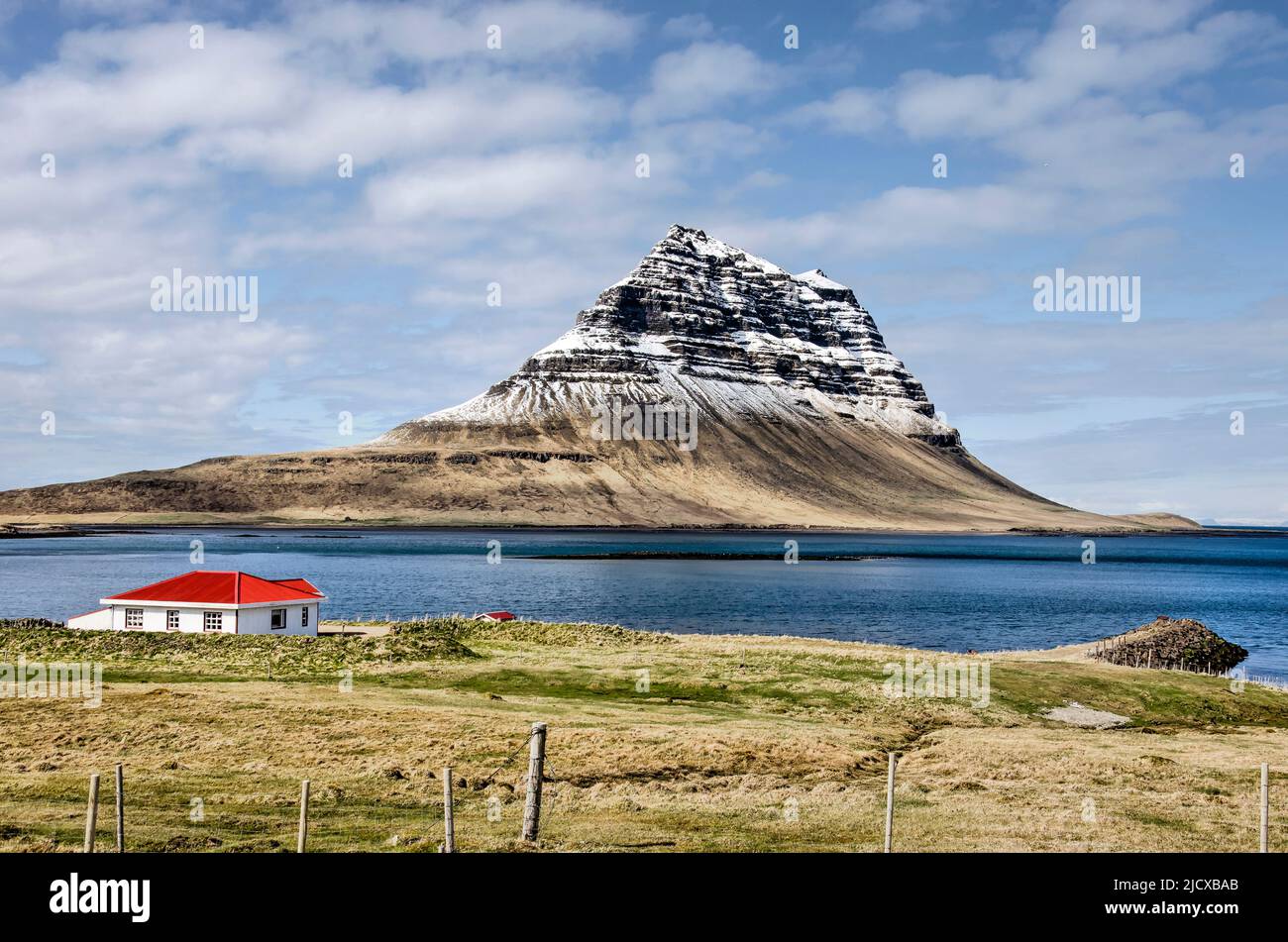 grundarfjordur-iceland-may-6-2022-small-red-and-white-house-with-a