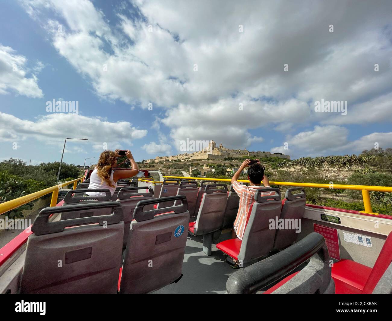 Hop-on-hop-off tourists enjoy the view Stock Photo