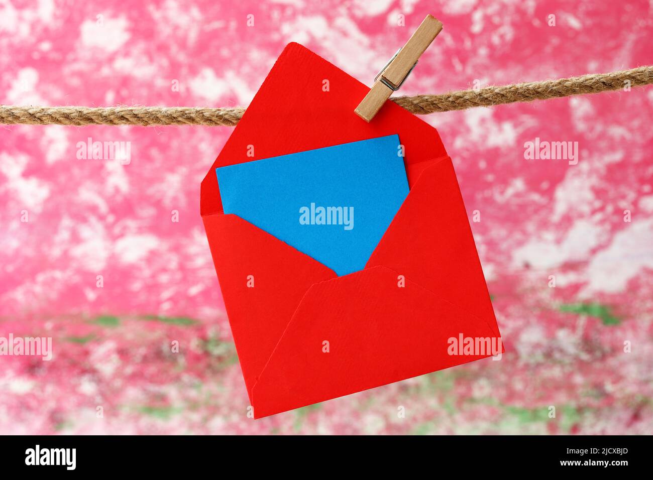 Note paper hanging on clothesline Stock Photo