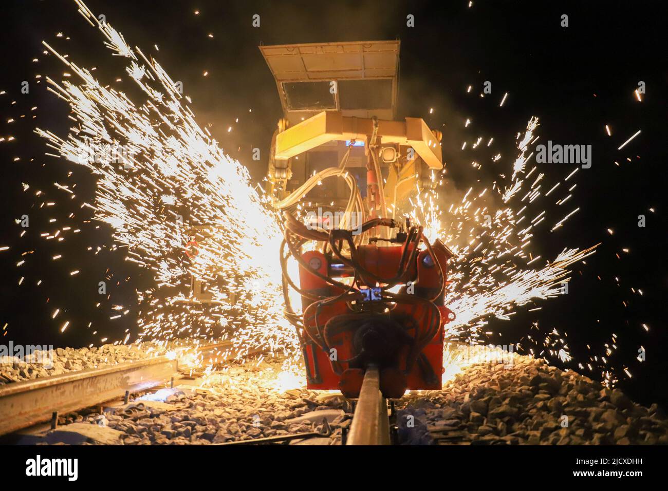 Urumqi. 8th Oct, 2020. A shower of sparks is sent out as a rail welding machine works on the track of the Hotan-Ruoqiang Railway in northwest China's Xinjiang Uygur Autonomous Region, Oct. 8, 2020. Credit: Guo Baolin/Xinhua/Alamy Live News Stock Photo