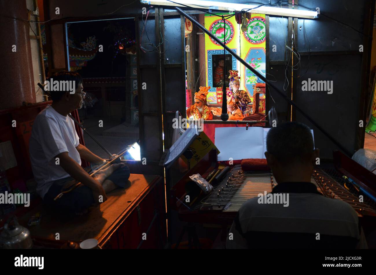 Thai people of chinese descent playing musical instruments sing song for acting traditional chinese contemporary classical opera for show local people Stock Photo