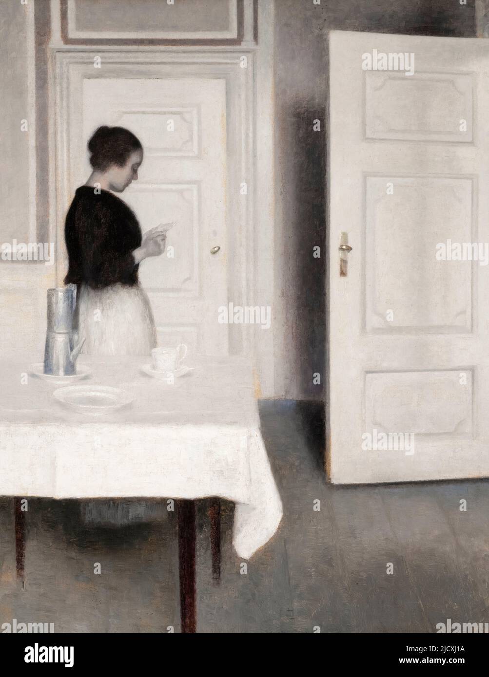 Vilhelm Hammershoi, painting, Ida Reading a Letter, oil on canvas, 1899 Stock Photo