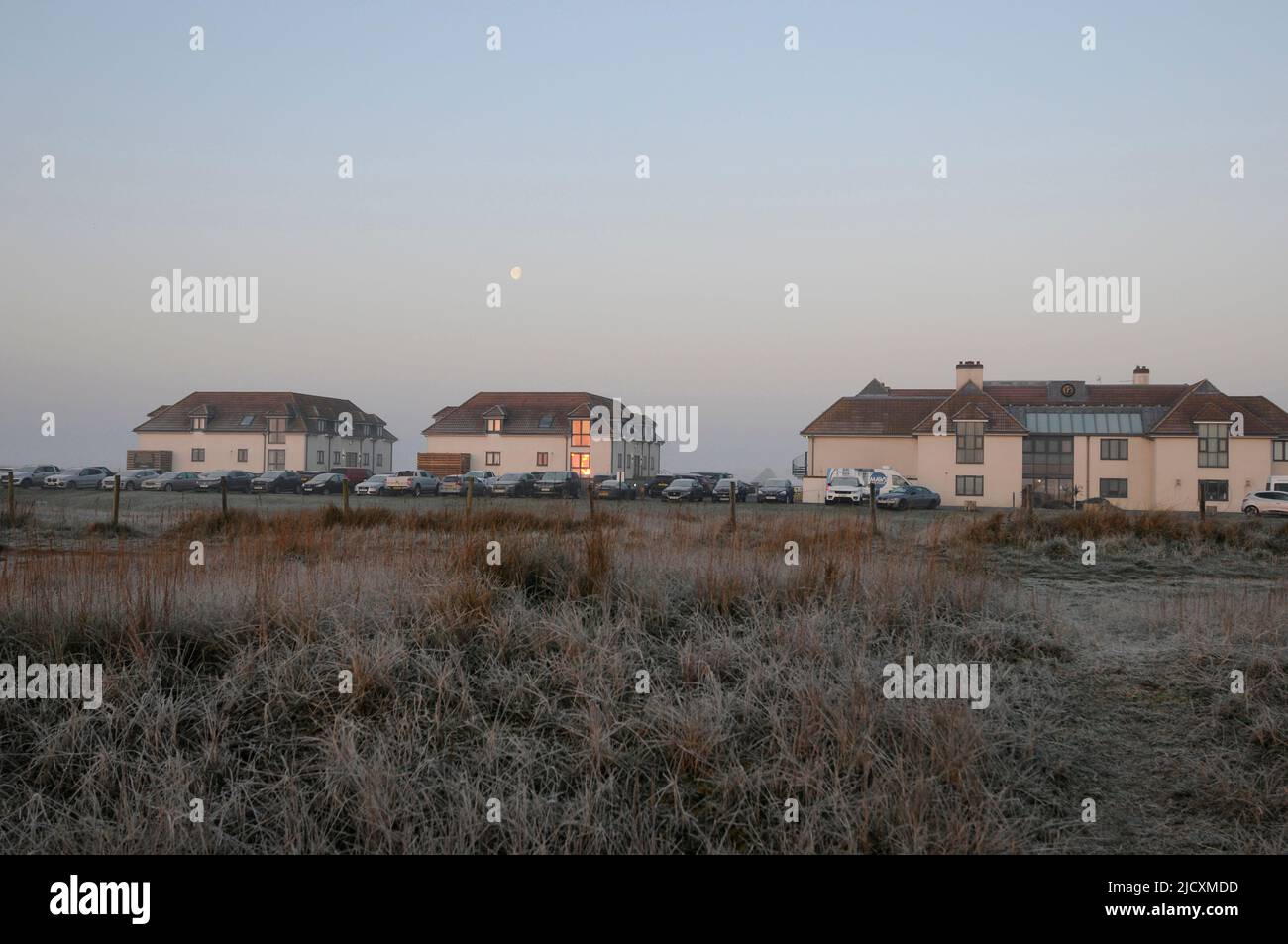 Princes Golf Club - view from Pegwell Bay to The Lodge on a Frosty morning at sunrise, Sandwich, Kent, England Stock Photo