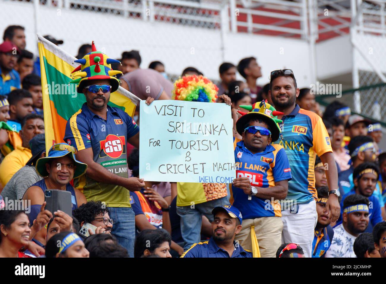 Kandy, Sri Lanka. 16th June 2022. Sri Lankan cricket fans hold a placard during the 2nd ODI cricket match between Sri Lanka vs Australia at the Pallekele International Cricket Stadium in Kandy on 16th June, 2022. Viraj Kothalwala/Alamy Live News Stock Photo