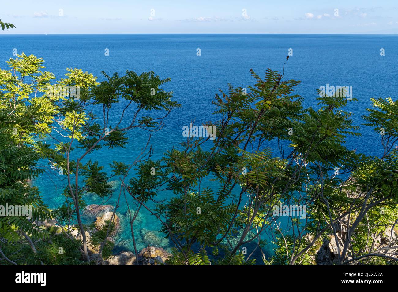 The crystal clear waters of the Calabrian coast in southern Italy Stock Photo