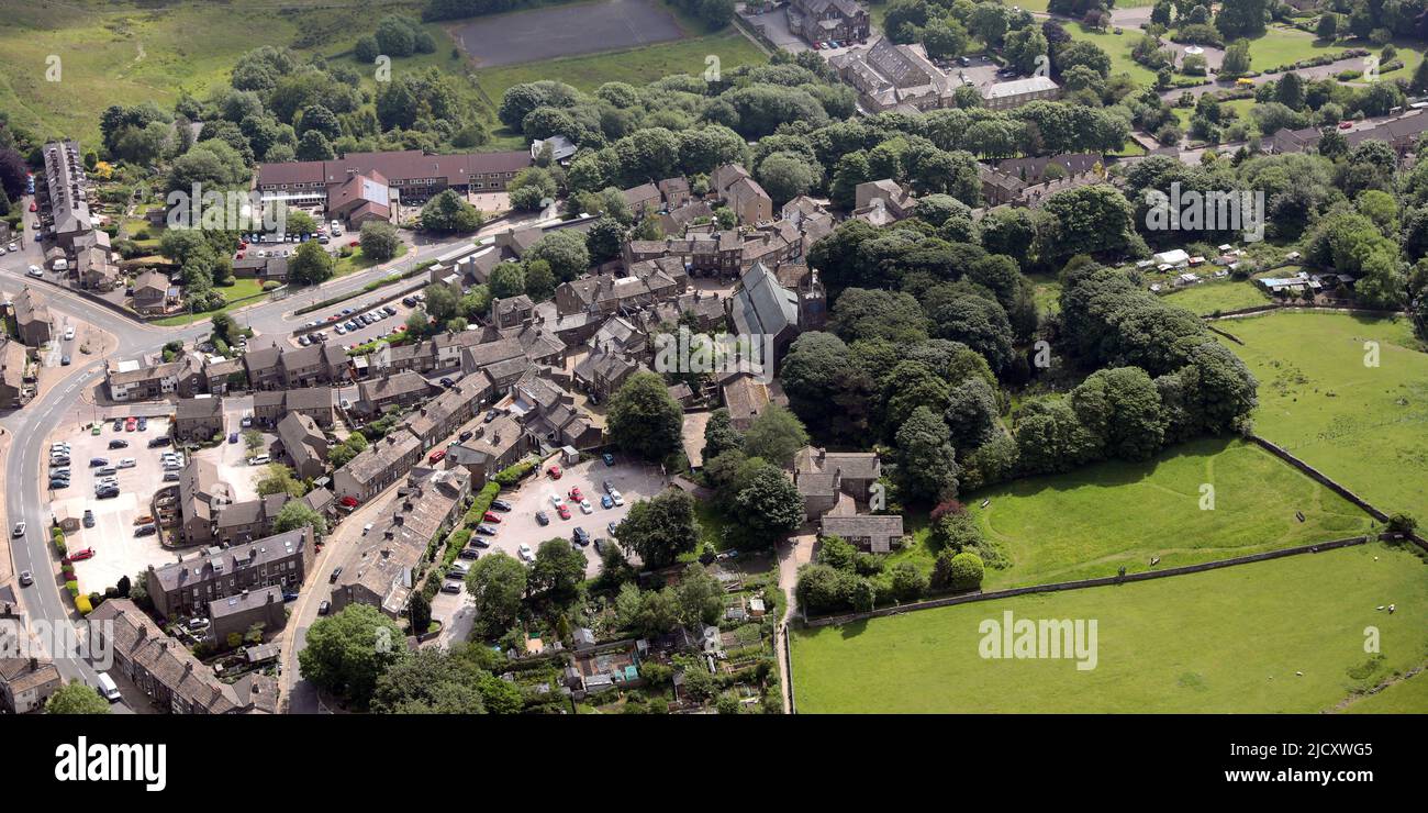 Aerial view of Howarth village, home of the Bronte sisters, Yorkshire. The Brontë Parsonage Museum is in the immediate forground, just right of centre Stock Photo