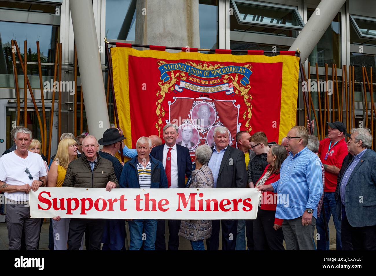 Edinburgh Scotland, UK June 16 2022. Former miners and their families  joined by Scottish Labour MSPs outside Scottish Parliament ahead of the final vote on the miners’ strike pardons bill. credit sst/alamy live news Stock Photo