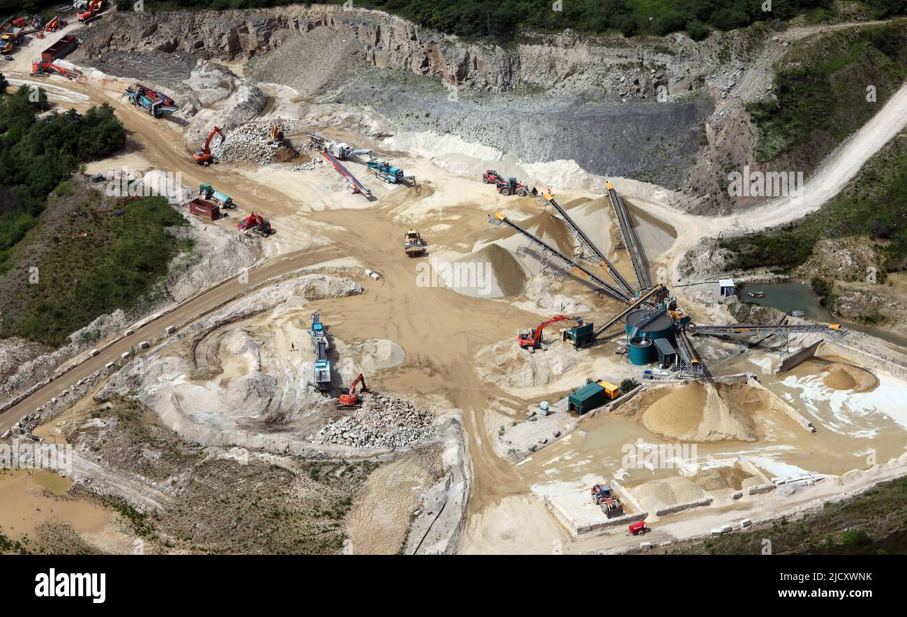 aerial view of a busy working quarry in England, UK Stock Photo