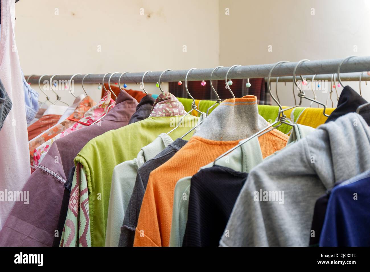 various colors of clothes that are dried Stock Photo Alamy