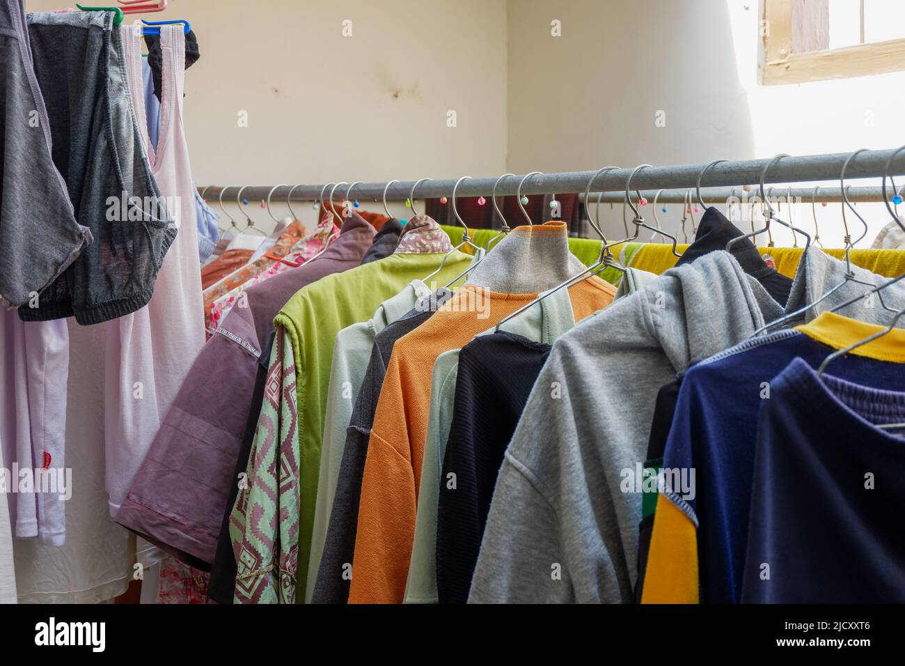 various colors of clothes that are dried Stock Photo Alamy