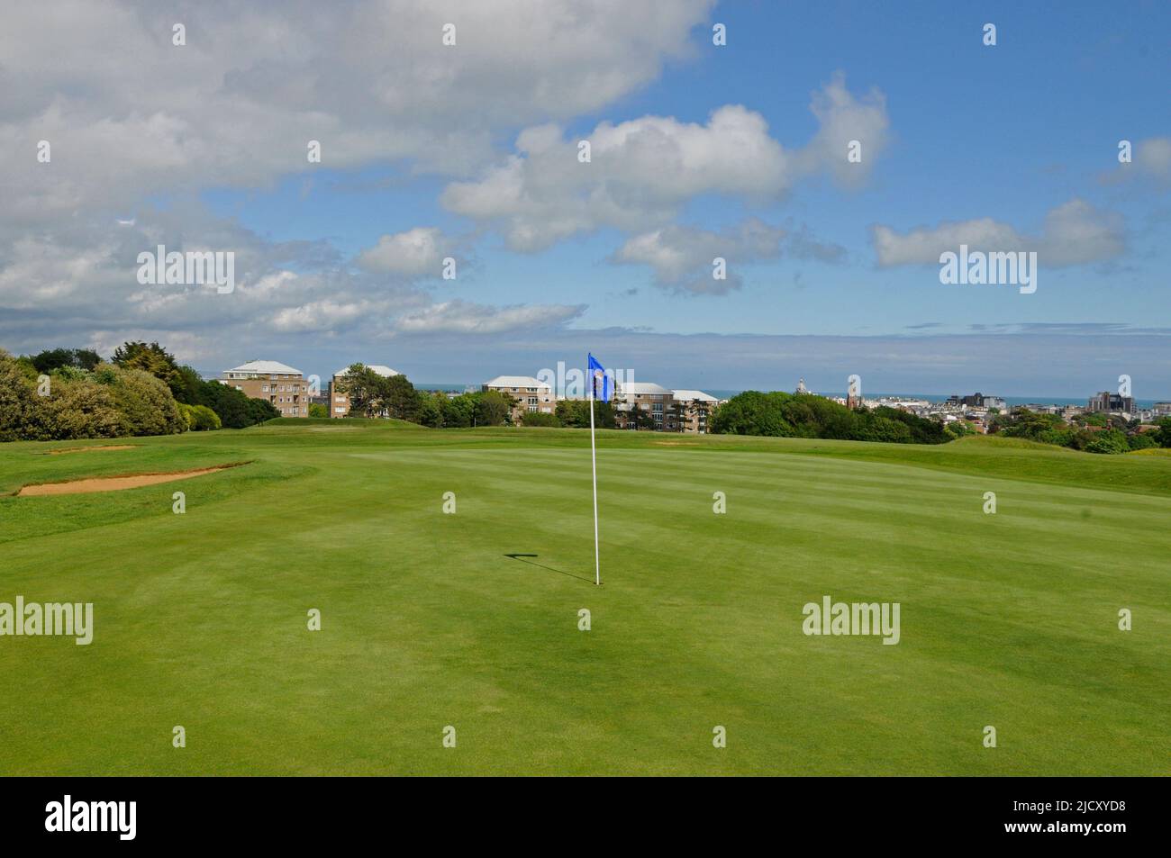 View over 18th Green on Devonshire Course to the town of Eastbourne, Royal Eastbourne Golf Club, Eastbourne, Sussex, England Stock Photo