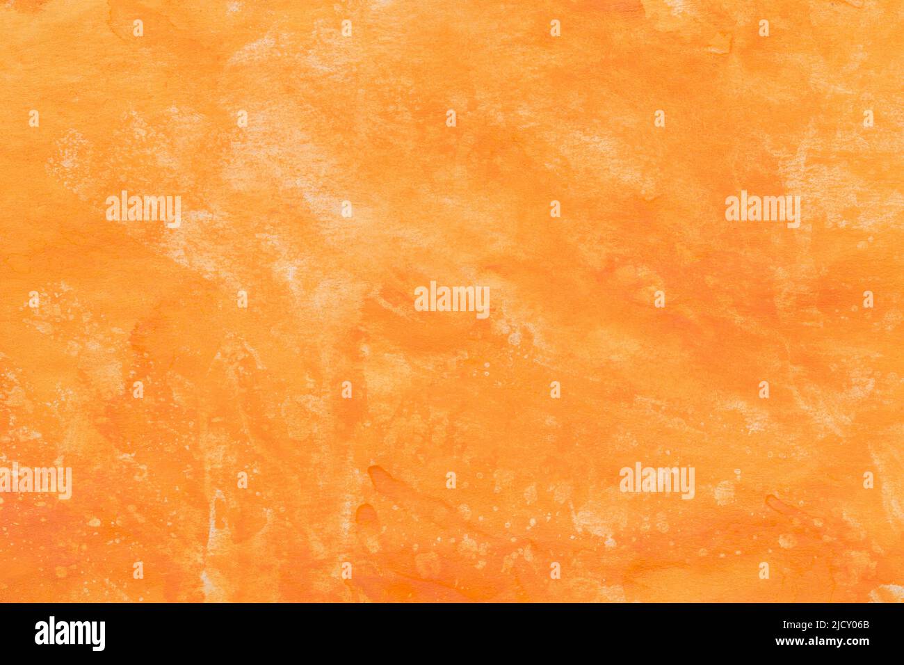 orange painted watercolor on paper background texture Stock Photo