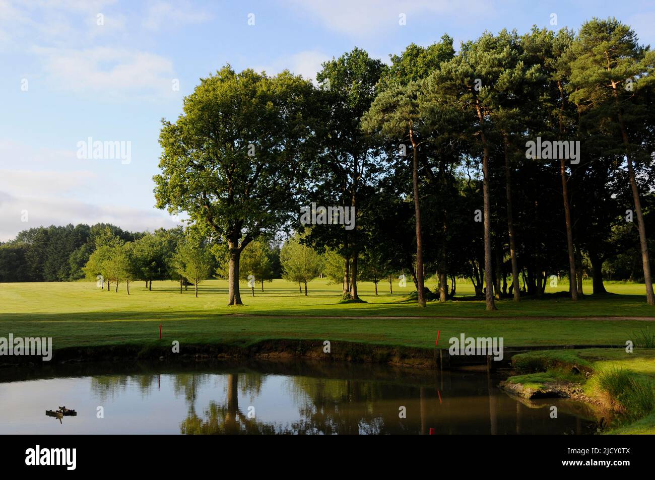 Early morning view over small pond to 11th Fairway, Bentley Golf Club