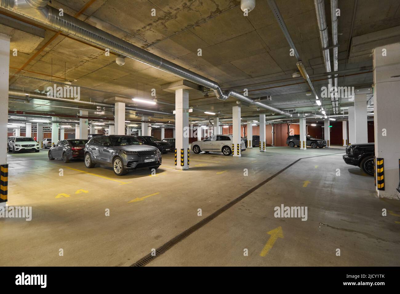 Photo of underground parking in a residential complex Stock Photo