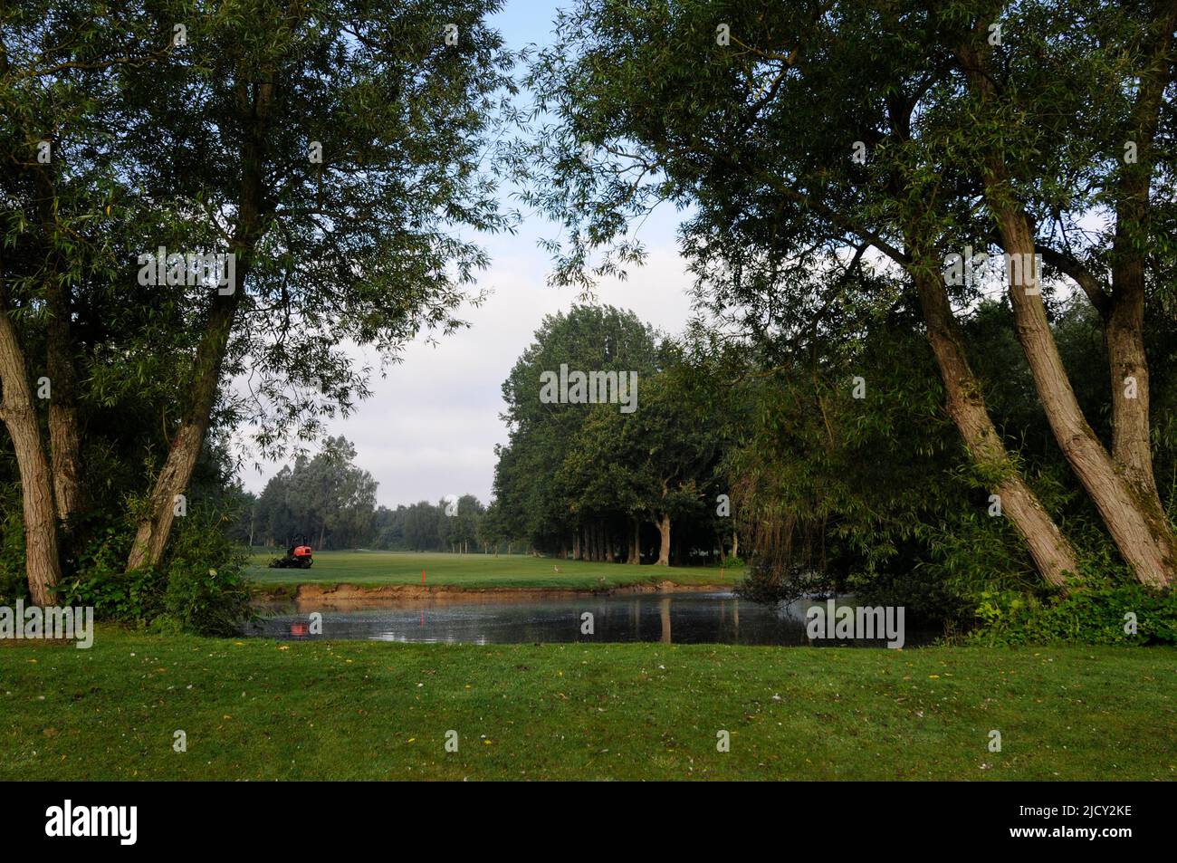 Early morning view from 1st Fairway over Pond to 4th Fairway; Bentley Golf Club, Brentwood, Essex, England Stock Photo