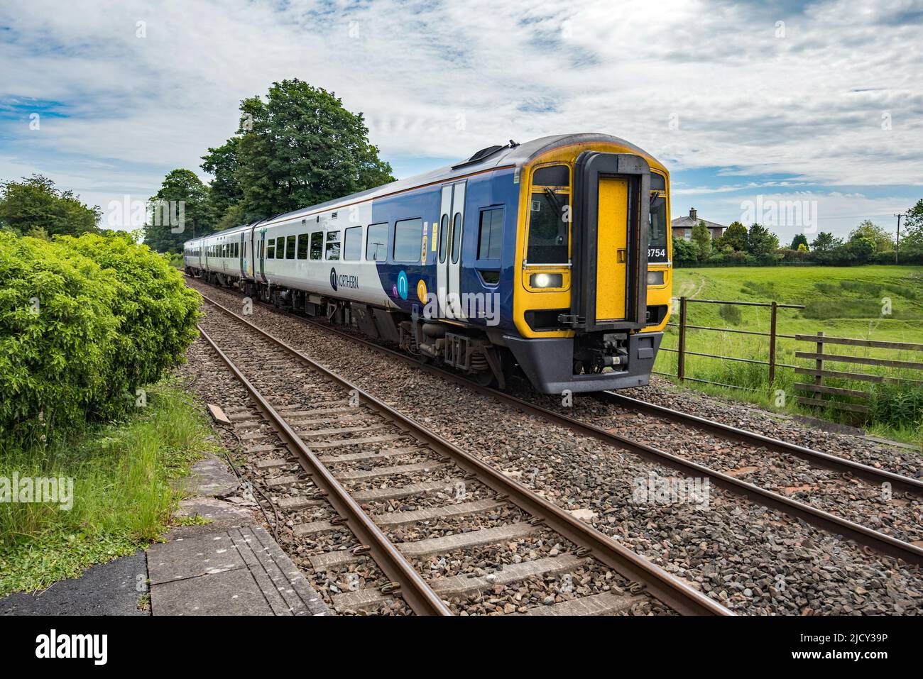 Northern Rail diesel passing through Long Preston 16th June 2022 Stock Photo