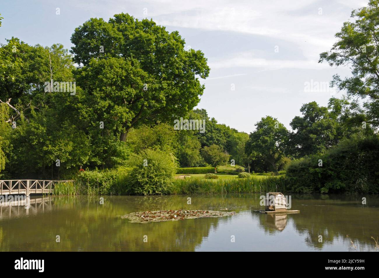 View over pond on the 18th Hole, West Course, Sundridge Park Golf Club, Bromley, Kent, England Stock Photo