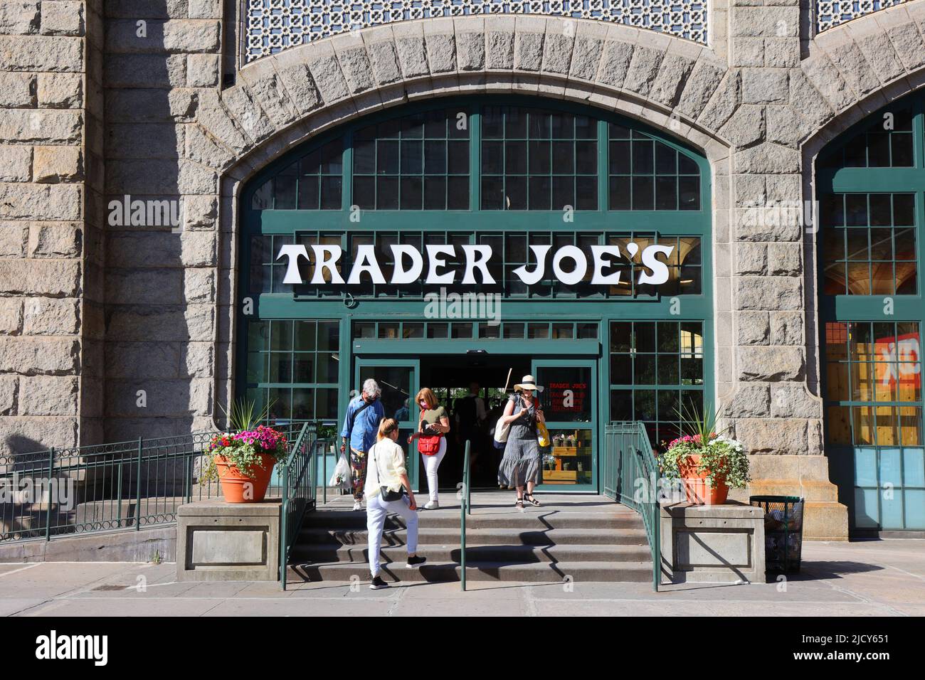 Trader Joes, 405 E 59th St, New York, NYC storefront photo of a grocery store in the arcade under the Queensboro Bridge. Stock Photo