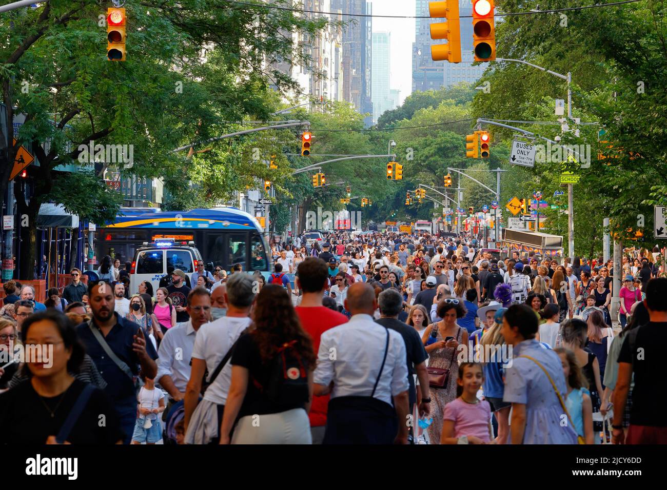 People and crowds at the Museum Mile Festival along Manhattan's Fifth Avenue in New York, NY, June 14, 2022. Stock Photo