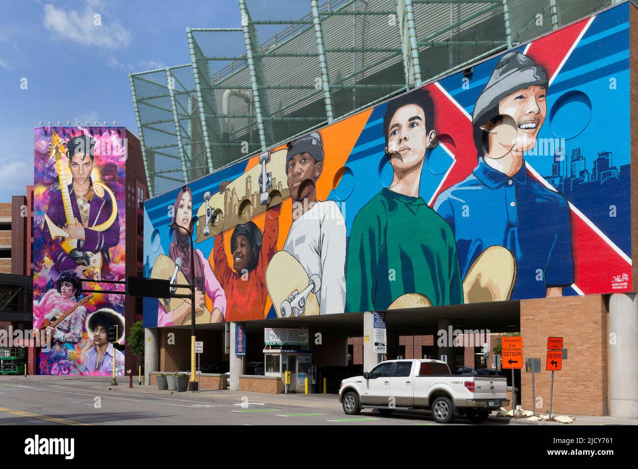 The 2022 mural by artist Hiero Veiga of the musician Prince (left) and the 2021 Reggie LeFlore, X Marks the Spot mural along 1st Avenue. Stock Photo