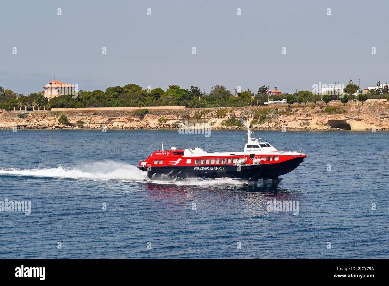 Aegina, Greece, - May 2022: Fast hydrofoil ferry arriving at the island from Athens Stock Photo