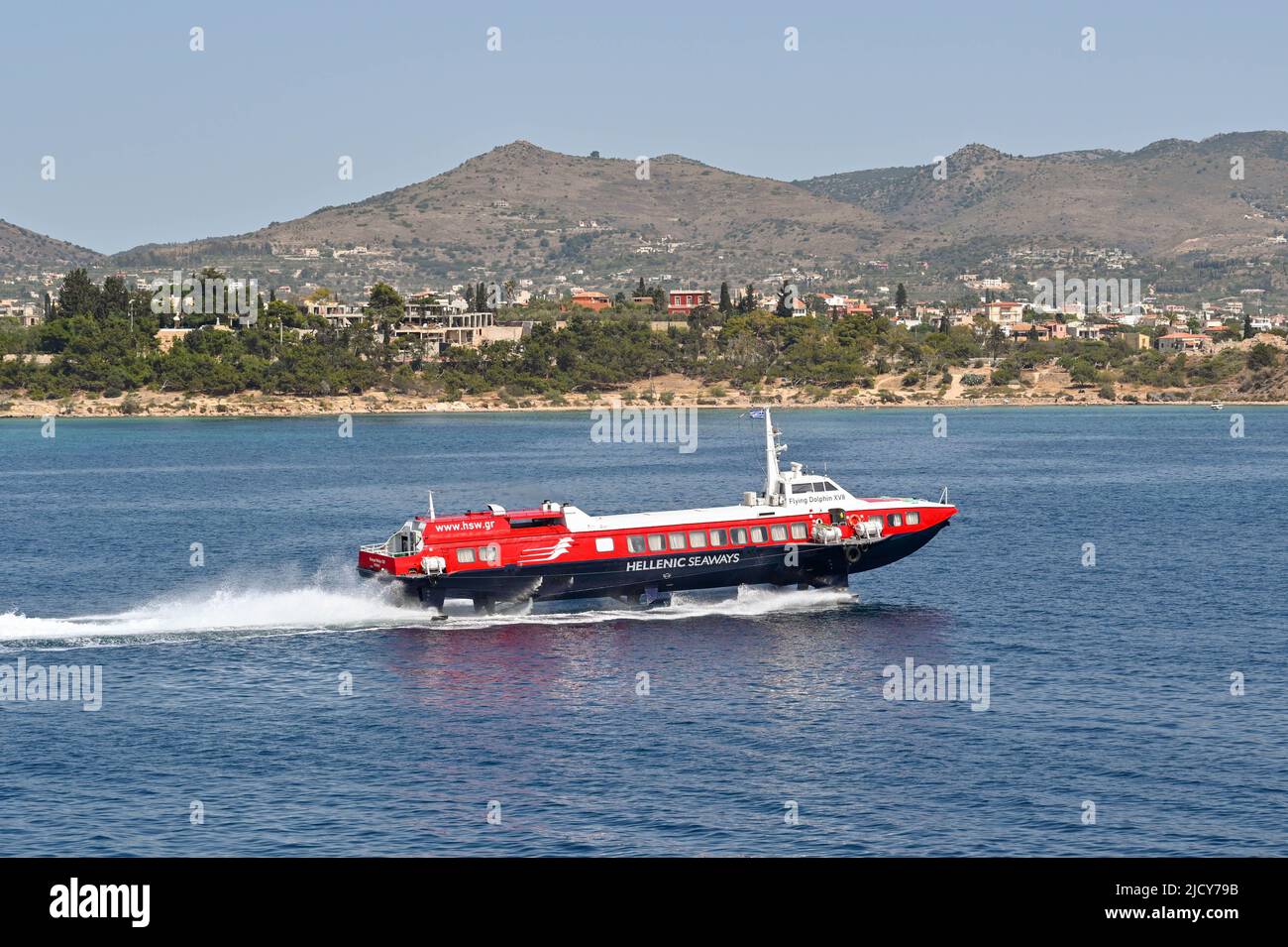 Aegina, Greece, - May 2022: Fast hydrofoil ferry arriving at the island from Athens Stock Photo