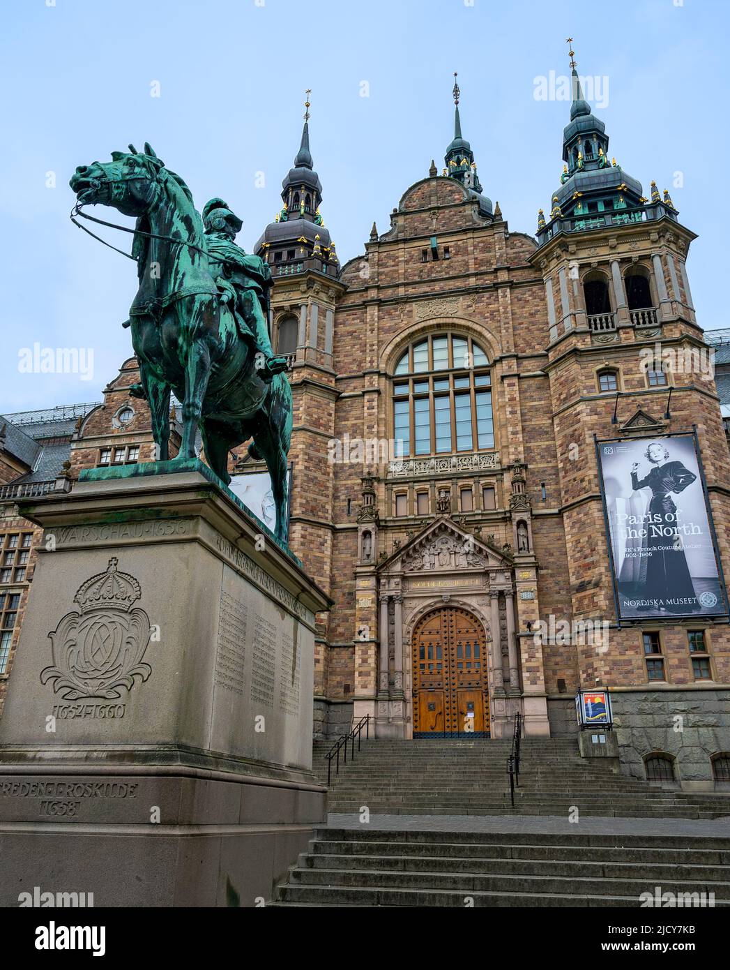 Front of the building of the nordic museum with equestrian statue of King Carl X Gustav in Stockholm, Sweden Stock Photo
