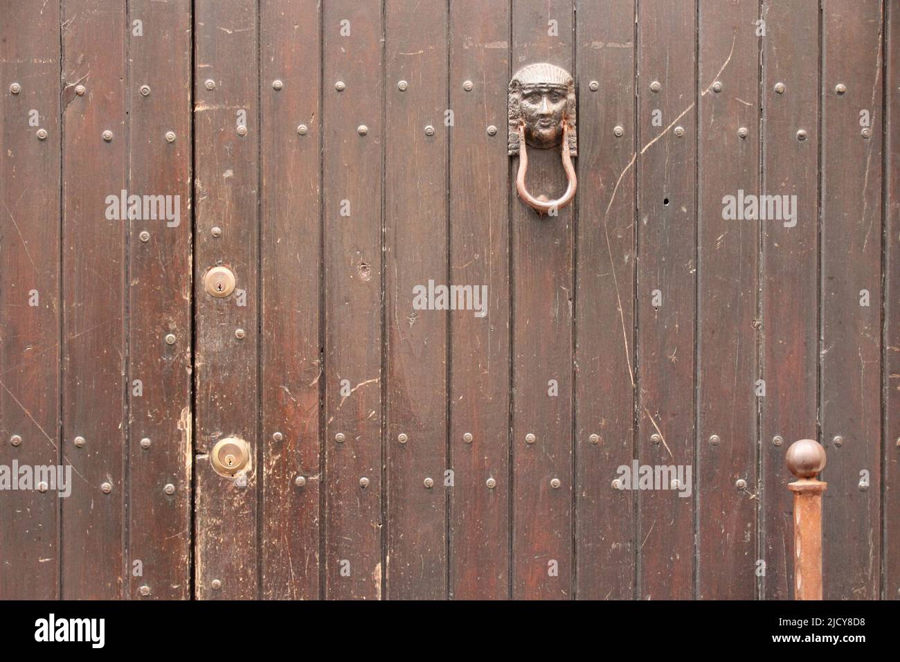 door with knocker in taormina in sicily (italy) Stock Photo