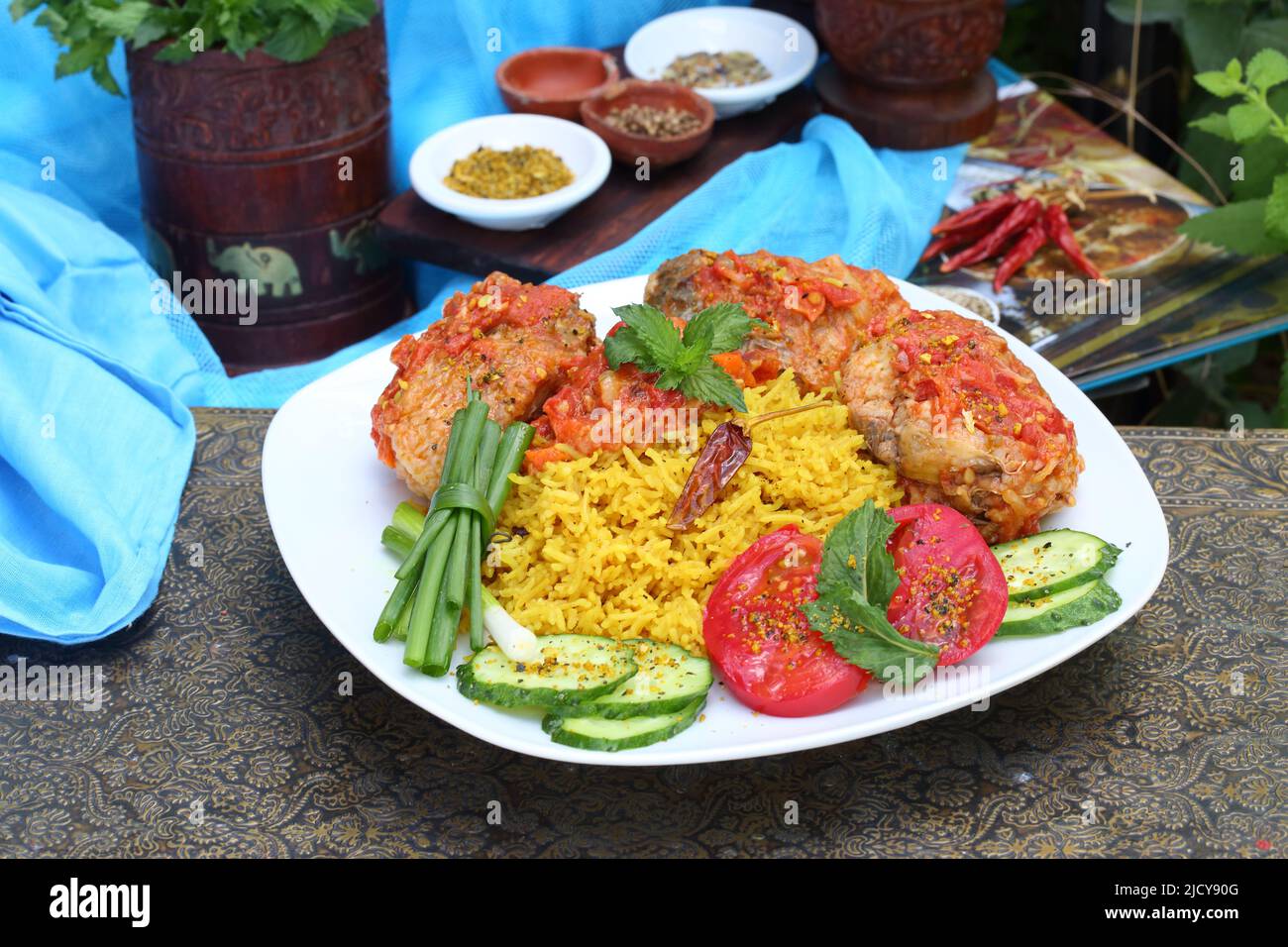 Fried fish in tomato sauce with basmati rice. Indian food Stock Photo Alamy