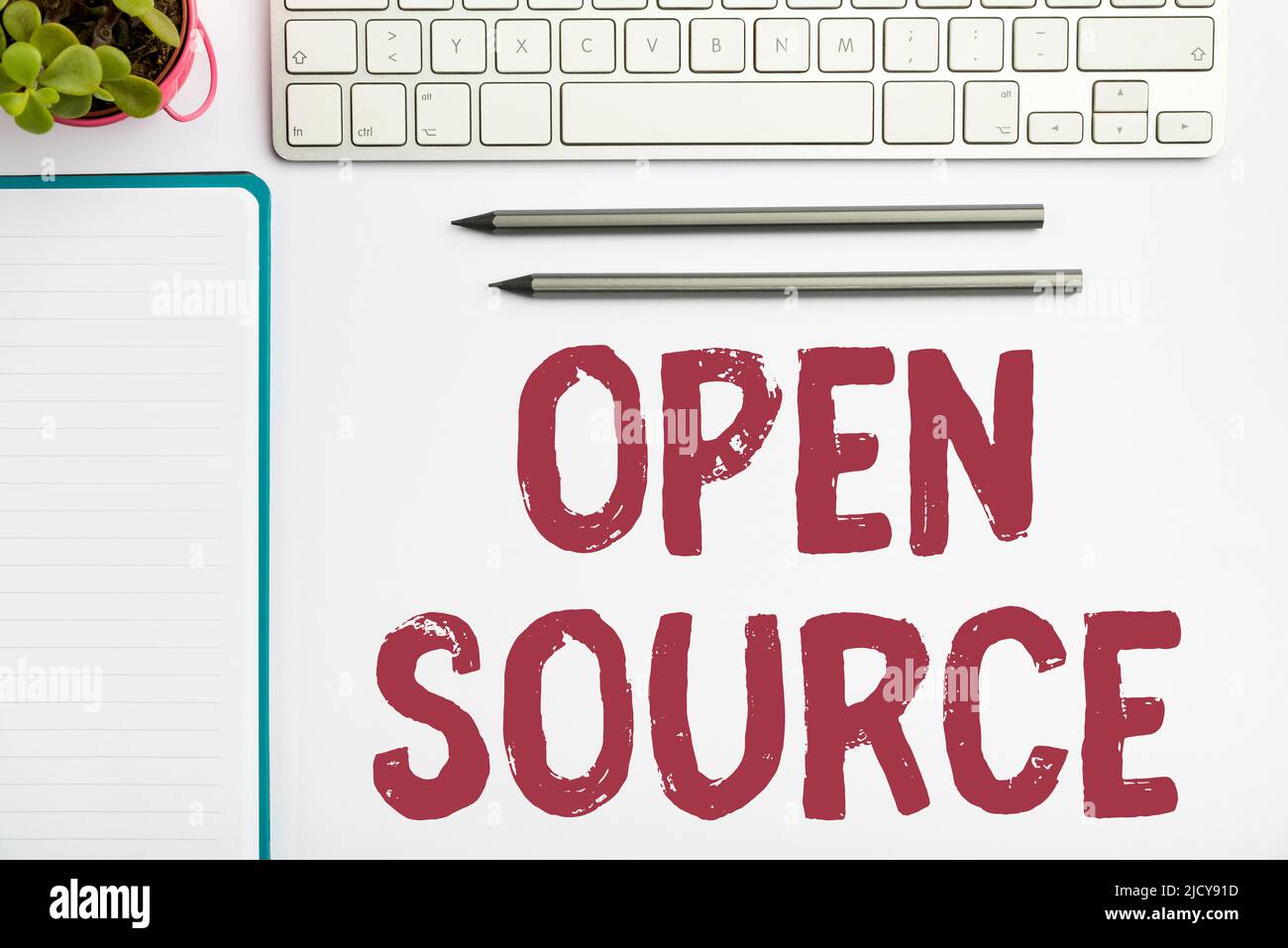 Handwriting text Open Source. Word for denoting software which original source code freely available Flashy School Office Supplies, Teaching Learning Stock Photo