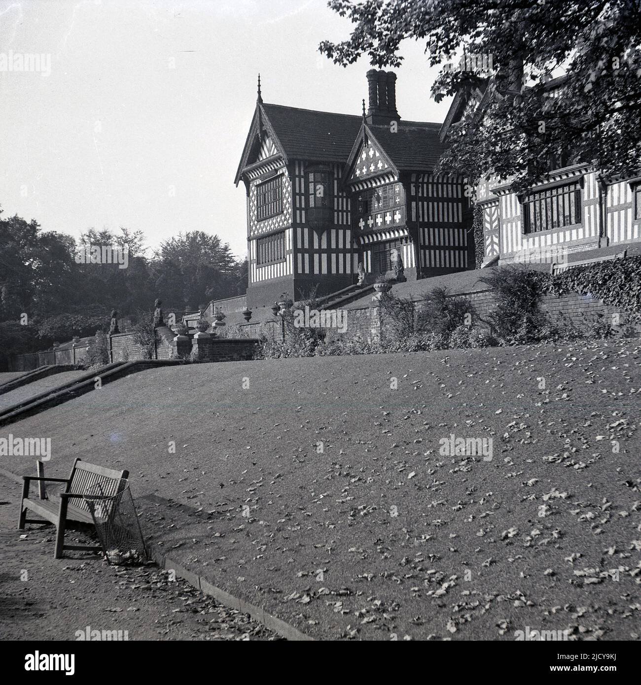 1940s, historical, view from the terraces of the rear of Bramall Hall, Bramhall, Stockport, England, UK. A timber-framed Tudor manor house that dates back to the 14th century, with later additions, the house and surrounding parkland was acquired by the local authority in 1935 and became a museum. The Davenport family, which it is believed built the house, held the manor for over 500 years. Stock Photo