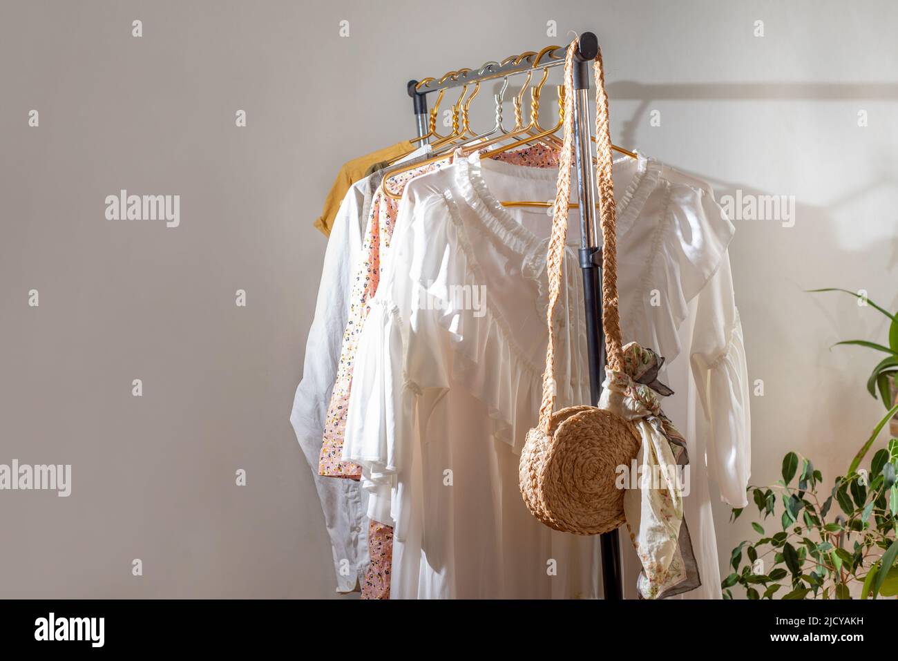 Secondhand clothes on the rail. The concept of sustainable economic